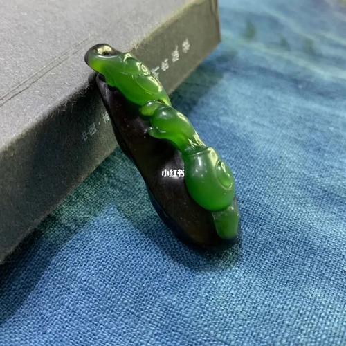 碧玉巧雕蜗牛 灵动盘踞，巧夺天工